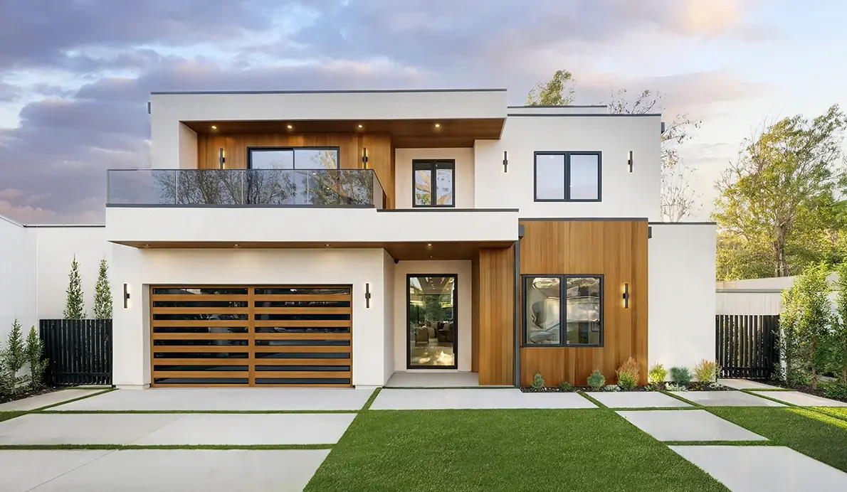 Wood-look plank garage door with inlay windows on a contemporary home.